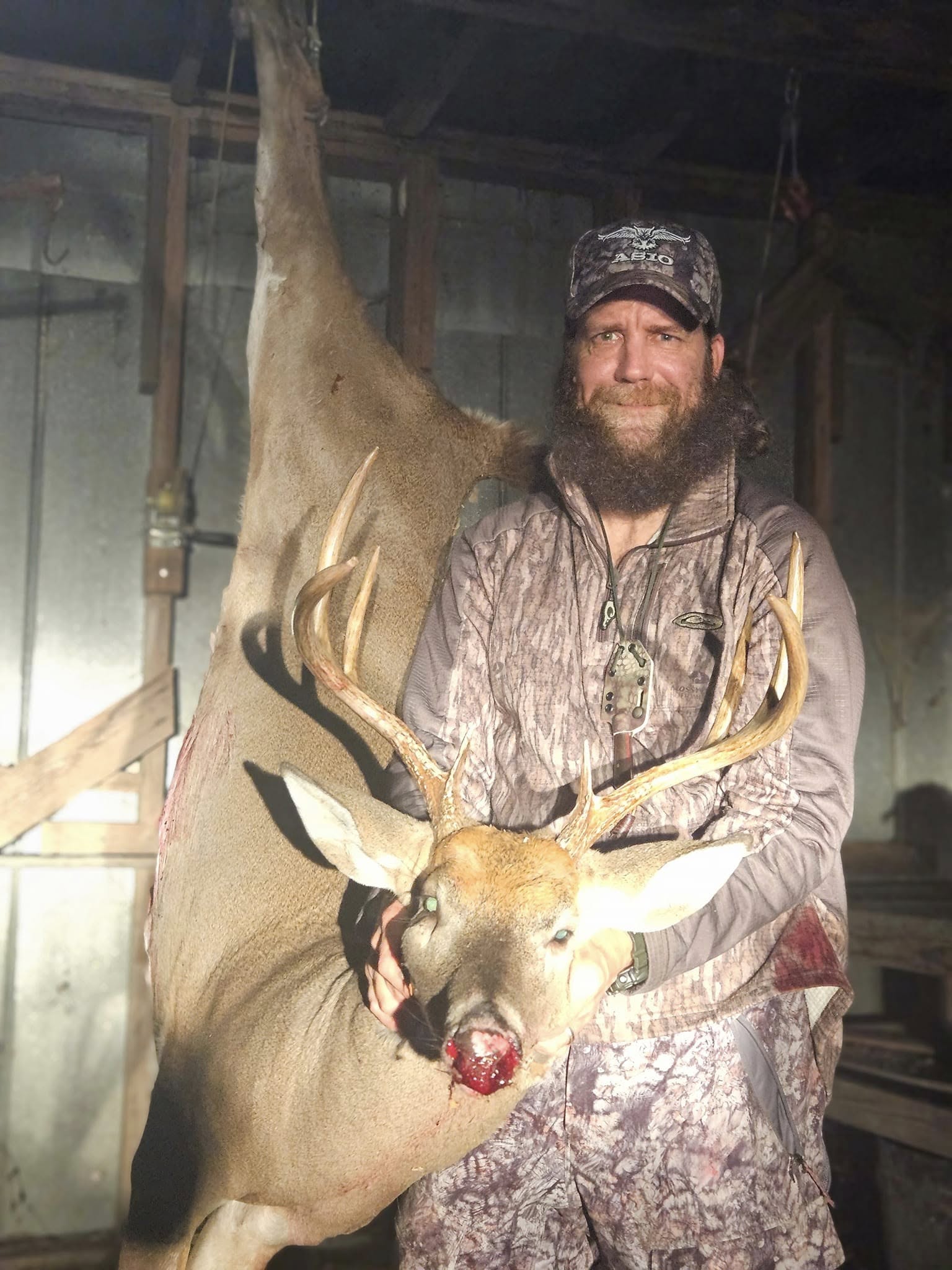 Mark with a harvested buck at the club